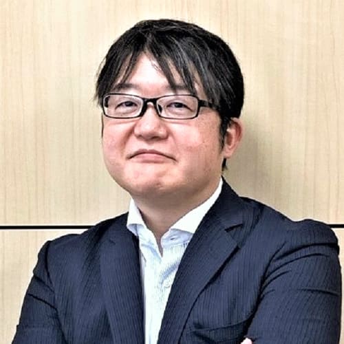 鈴木 健規 氏